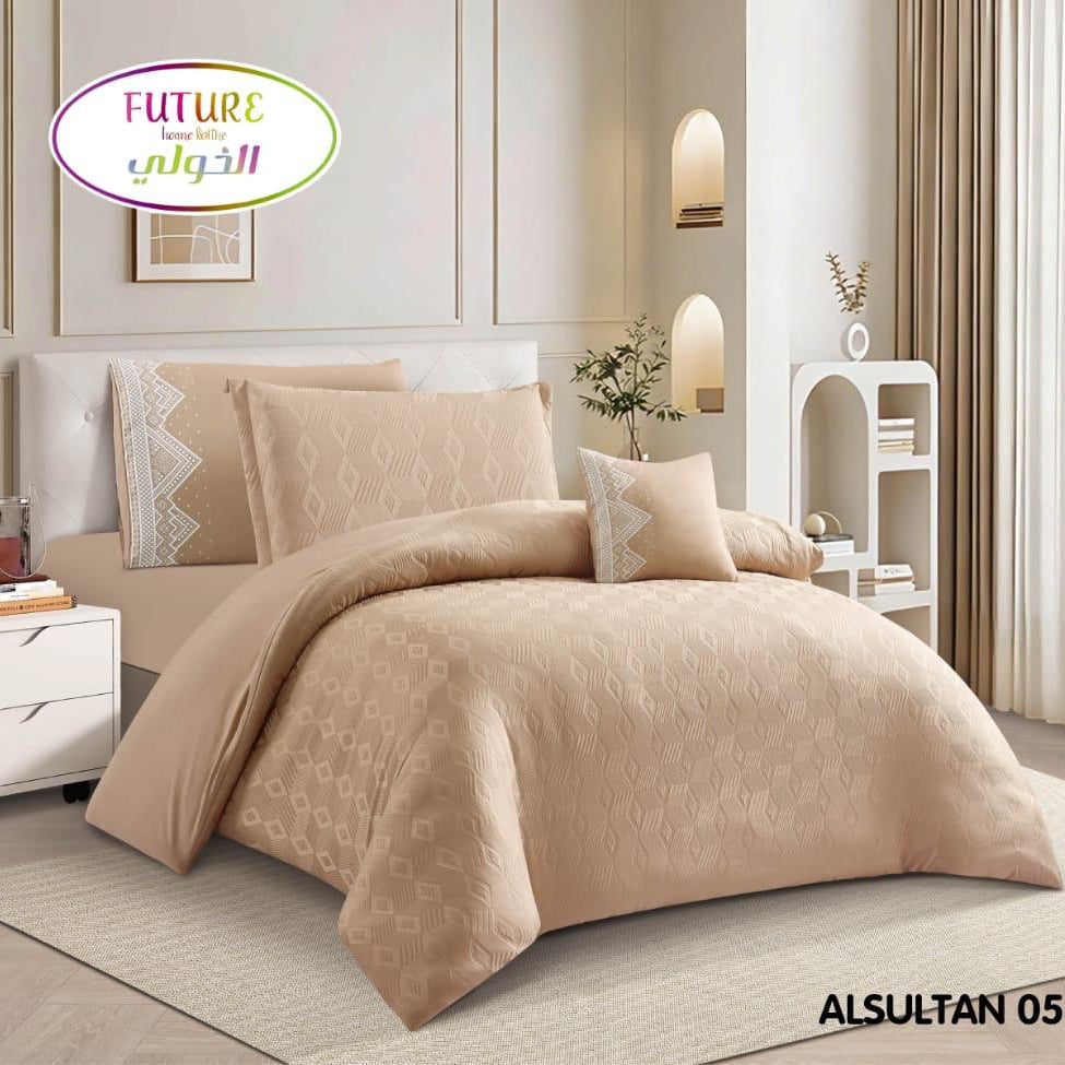 A beige 5-piece comforter set displayed on a bed in a styled bedroom scene, with a product inset showing the folded set and text listing the components. The brand logo 'FUTURE' with Arabic text appears at the top left.